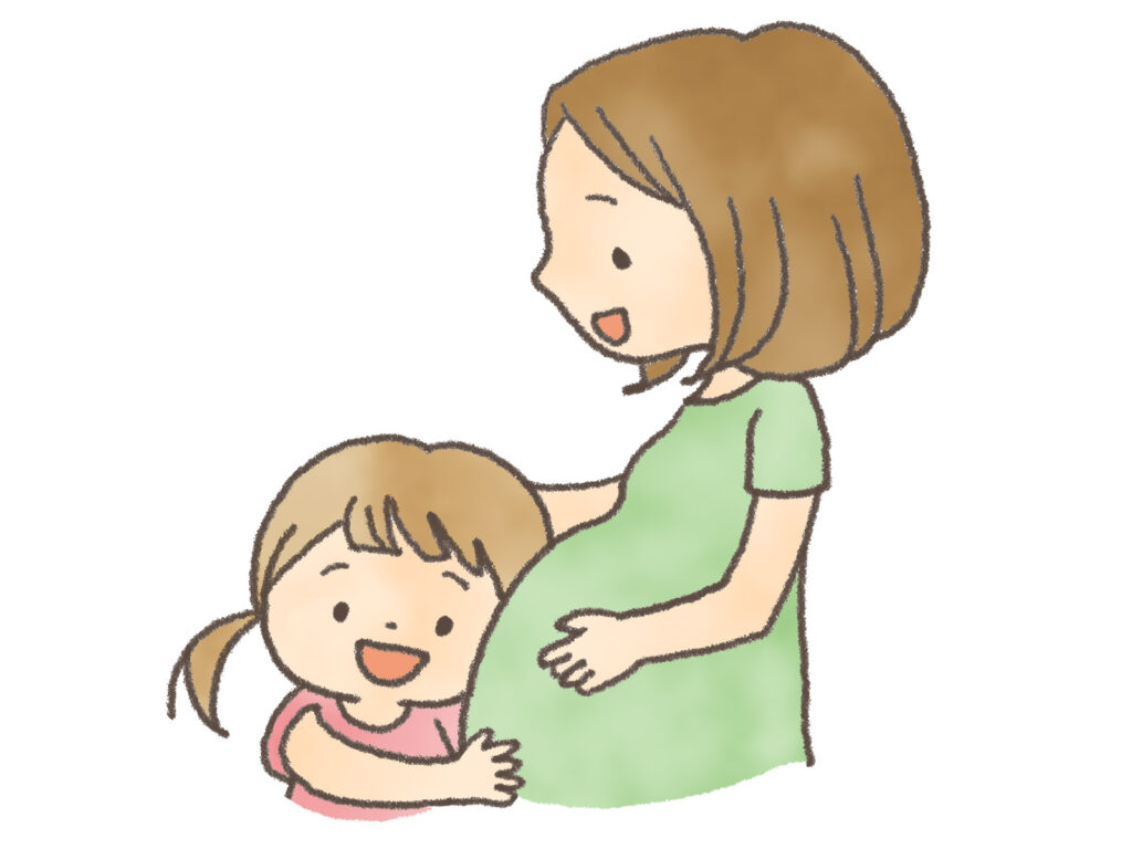 赤ちゃんの音を聞くお姉ちゃん